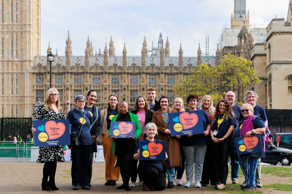 An image of people holding signs saying "value our love" outside Westminster.